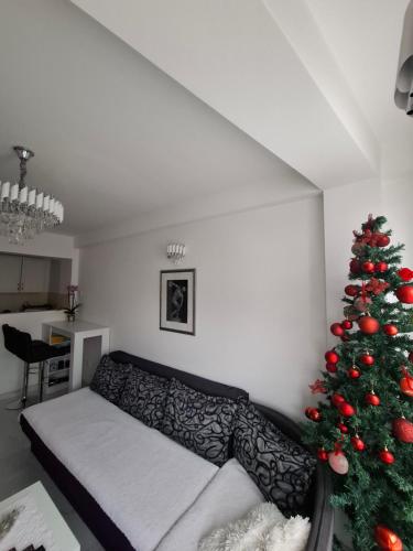 Ένα ή περισσότερα κρεβάτια σε δωμάτιο στο GLAVNA LuX