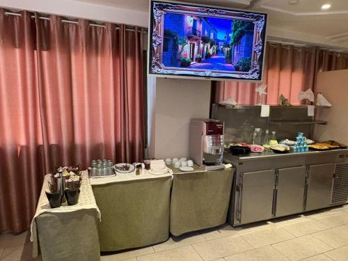 Kuchyň nebo kuchyňský kout v ubytování Hotel Amine