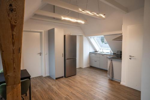 Η κουζίνα ή μικρή κουζίνα στο Moderne Ferienwohnung - mit Balkon & Stellplatz