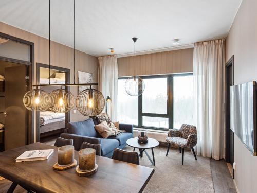 Posezení v ubytování Stötens Stugor & Lägenheter