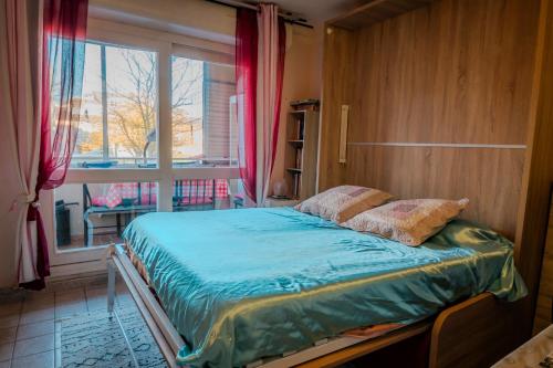 Postel nebo postele na pokoji v ubytování Appt Rez-de-jardin