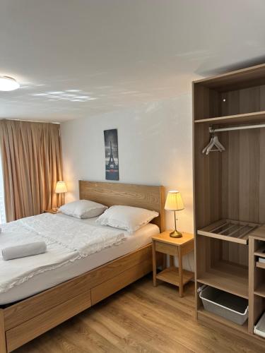 Ένα ή περισσότερα κρεβάτια σε δωμάτιο στο The Golf apartments