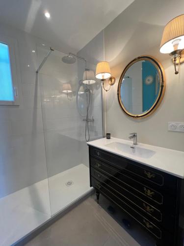 a bathroom with a sink and a shower at Golden hours luxury and panoramic view in Nice