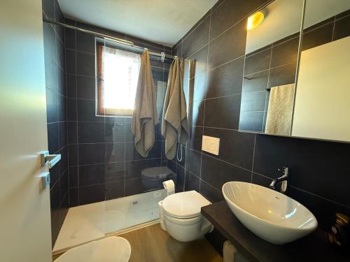 ห้องน้ำของ Attico del Sole sulle piste da sci - Box privato