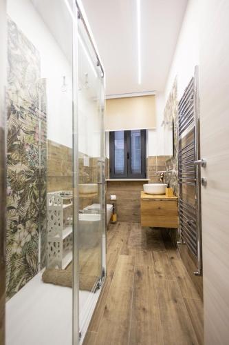 a bathroom with a shower and a sink at La Cartolina del Sannio in Campolattaro