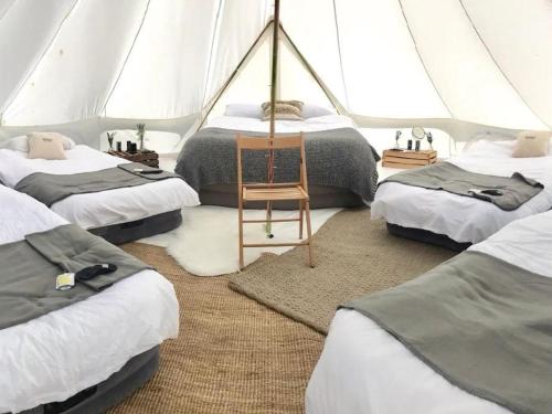 Ένα ή περισσότερα κρεβάτια σε δωμάτιο στο Evenementen Lokatie Bekspring