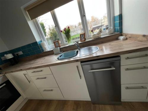 Η κουζίνα ή μικρή κουζίνα στο K Suites - Malt House