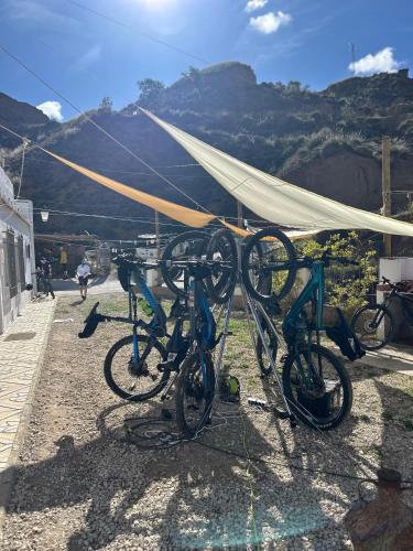 a group of bikes parked next to a tent at Bike Cueva - Desierto in Gorafe