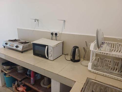 Η κουζίνα ή μικρή κουζίνα στο villa Calm Haven