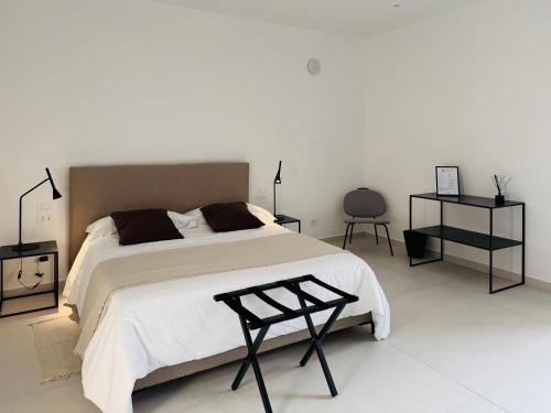 Ένα ή περισσότερα κρεβάτια σε δωμάτιο στο Resalio Agriturismo di charme