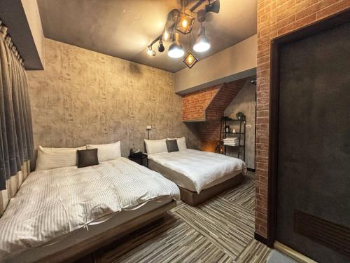 Un pat sau paturi într-o cameră la 一中街藻宿