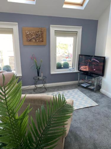 Μια τηλεόραση ή/και κέντρο ψυχαγωγίας στο The Downtown Loft