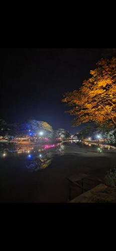 a view of a city at night with lights at Villa de Sancho in Phumĭ Réach Born