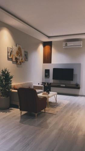 TV a/nebo společenská místnost v ubytování aljnanchalet