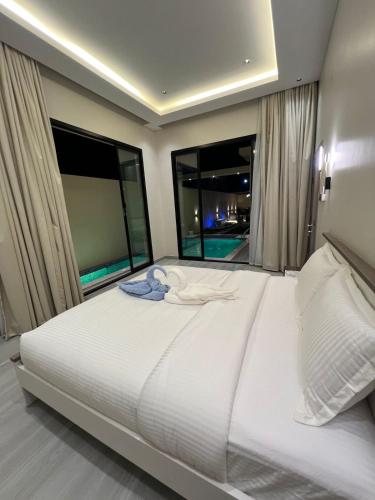 Postel nebo postele na pokoji v ubytování aljnanchalet