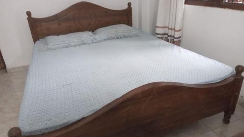 Ένα ή περισσότερα κρεβάτια σε δωμάτιο στο New Moon