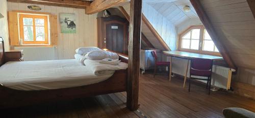 Postel nebo postele na pokoji v ubytování Hygge Młyńsko