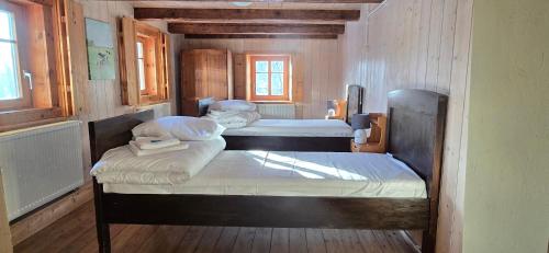 Postel nebo postele na pokoji v ubytování Hygge Młyńsko