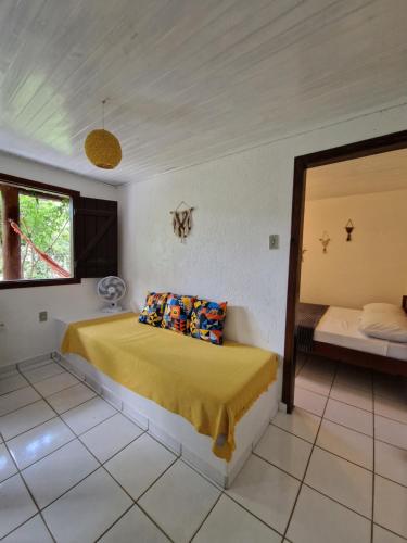 Кровать или кровати в номере Pousada Aconchego do Rosa - Centrinho do Rosa