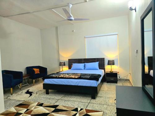 Ένα ή περισσότερα κρεβάτια σε δωμάτιο στο Amber Wood By Luxurious Landing