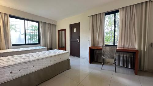 Postel nebo postele na pokoji v ubytování Luppi hotel Propriedade Particular