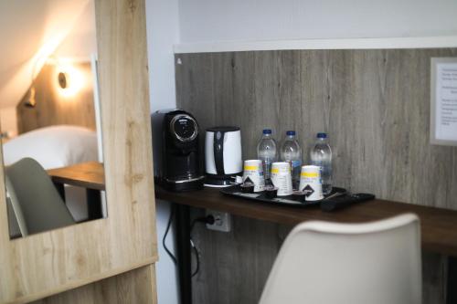 Příslušenství pro přípravu čaje a kávy v ubytování SkyLine Hotel Hannover