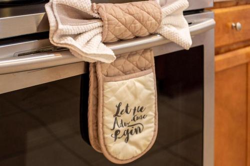 a towel hanging on the oven door of a stove at Watersong Sunbreeze Villa in Davenport