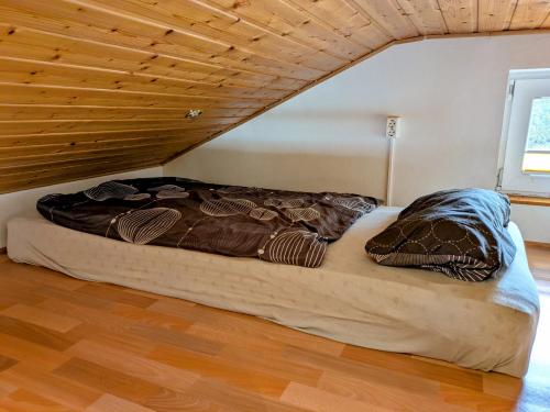 Giường trong phòng chung tại Ruhige Auszeit zwischen Wald & Erzgebirge