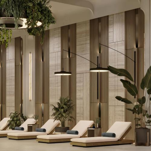 a waiting room with white chairs and potted plants at Radisson Blu Hotel, Almaty Airport in Almaty