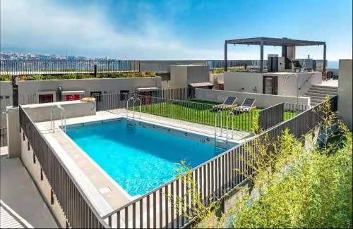 Swimmingpoolen hos eller tæt på HOM I Espectacular Estudio a Estrenar en Valparaíso 2PAX 2111