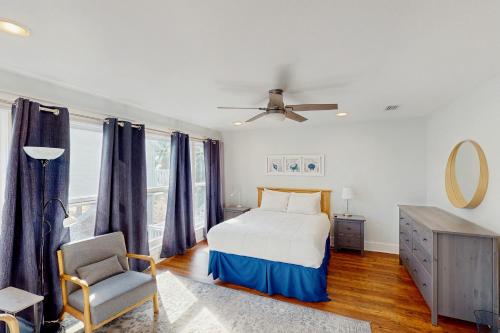 Ένα ή περισσότερα κρεβάτια σε δωμάτιο στο Shore Bird