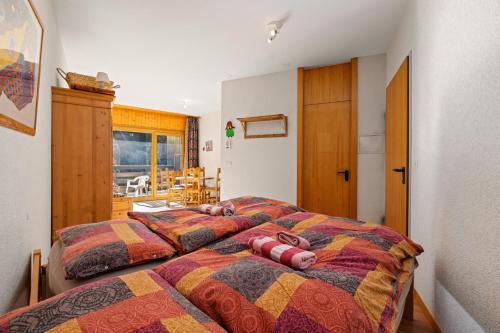 Postel nebo postele na pokoji v ubytování Mont-Fort E4 - 2 pers- au pied des pistes