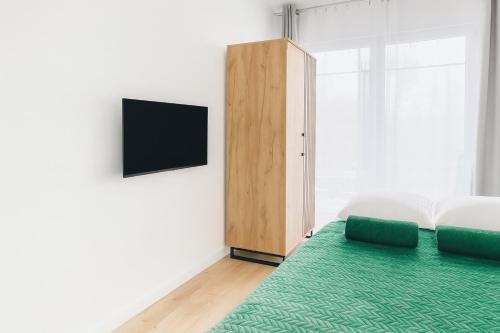 تلفاز و/أو أجهزة ترفيهية في Leśny Zakątek I Małe Bieszczady w Rzeszowie I grill sauna Starowiejska 6 Rzeszów