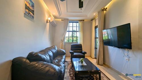 Televizors / izklaižu centrs naktsmītnē Chic studio