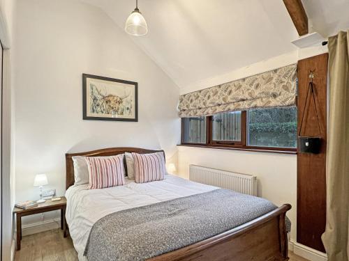 Ένα ή περισσότερα κρεβάτια σε δωμάτιο στο Daveys Barn Brendon Hill