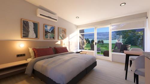Ένα ή περισσότερα κρεβάτια σε δωμάτιο στο Hotel Studlagil Canyon