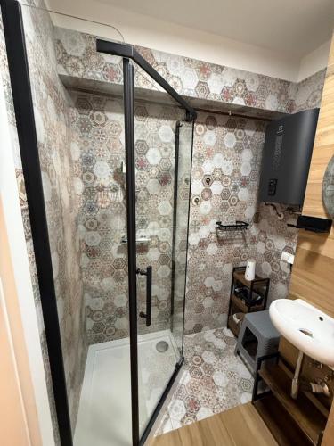 Ванная комната в Staromiejskie Retro Apartment by Downtown Apartments