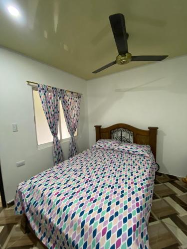 Ένα ή περισσότερα κρεβάτια σε δωμάτιο στο Apartamento Bustos 1