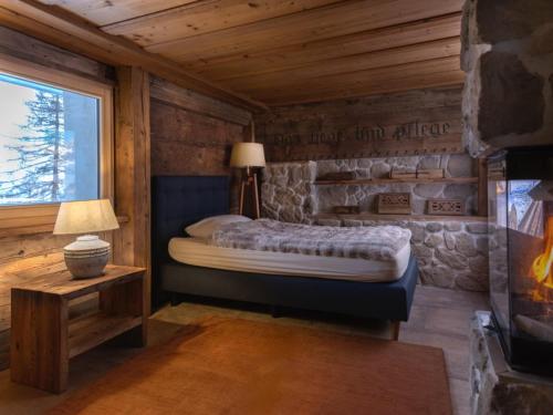 Postel nebo postele na pokoji v ubytování Chalet with fireplace and sauna