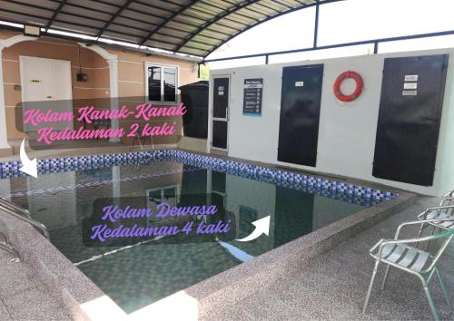 Swimmingpoolen hos eller tæt på Mami Homestay