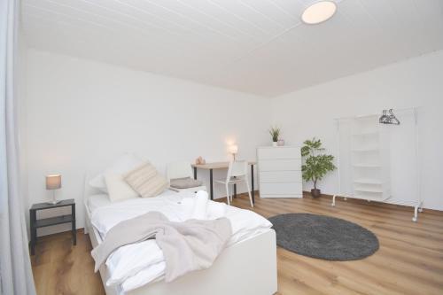 Ένα ή περισσότερα κρεβάτια σε δωμάτιο στο CO12 - Ferienwohnung in Coburg