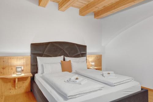 Postel nebo postele na pokoji v ubytování Alpin Chalet Samer Apt Berghütte