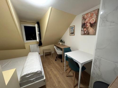 Postel nebo postele na pokoji v ubytování Hébergement design proche plage