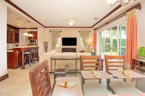 a living room with a dining room and a living room at Vista Bahia 1G - 3bed 3 bath Ocean View in La Mona