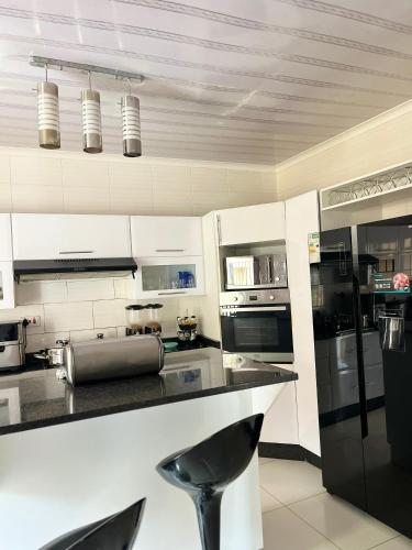 O bucătărie sau chicinetă la Lux9 Suites