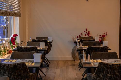 Un restaurant u otro lugar para comer en Hotel Atlanta