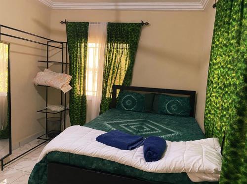 Postel nebo postele na pokoji v ubytování SOHNAKUNDA Guest House