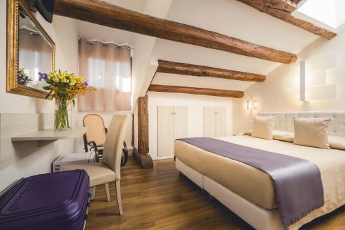 Ένα ή περισσότερα κρεβάτια σε δωμάτιο στο Locanda Ca' Lucrezia