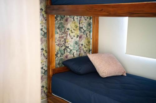 Ένα ή περισσότερα κρεβάτια σε δωμάτιο στο Casa Berlín