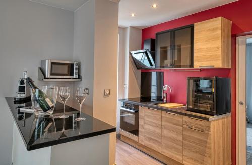 Η κουζίνα ή μικρή κουζίνα στο La nuit au Quai Chambre de luxe PinotNoir